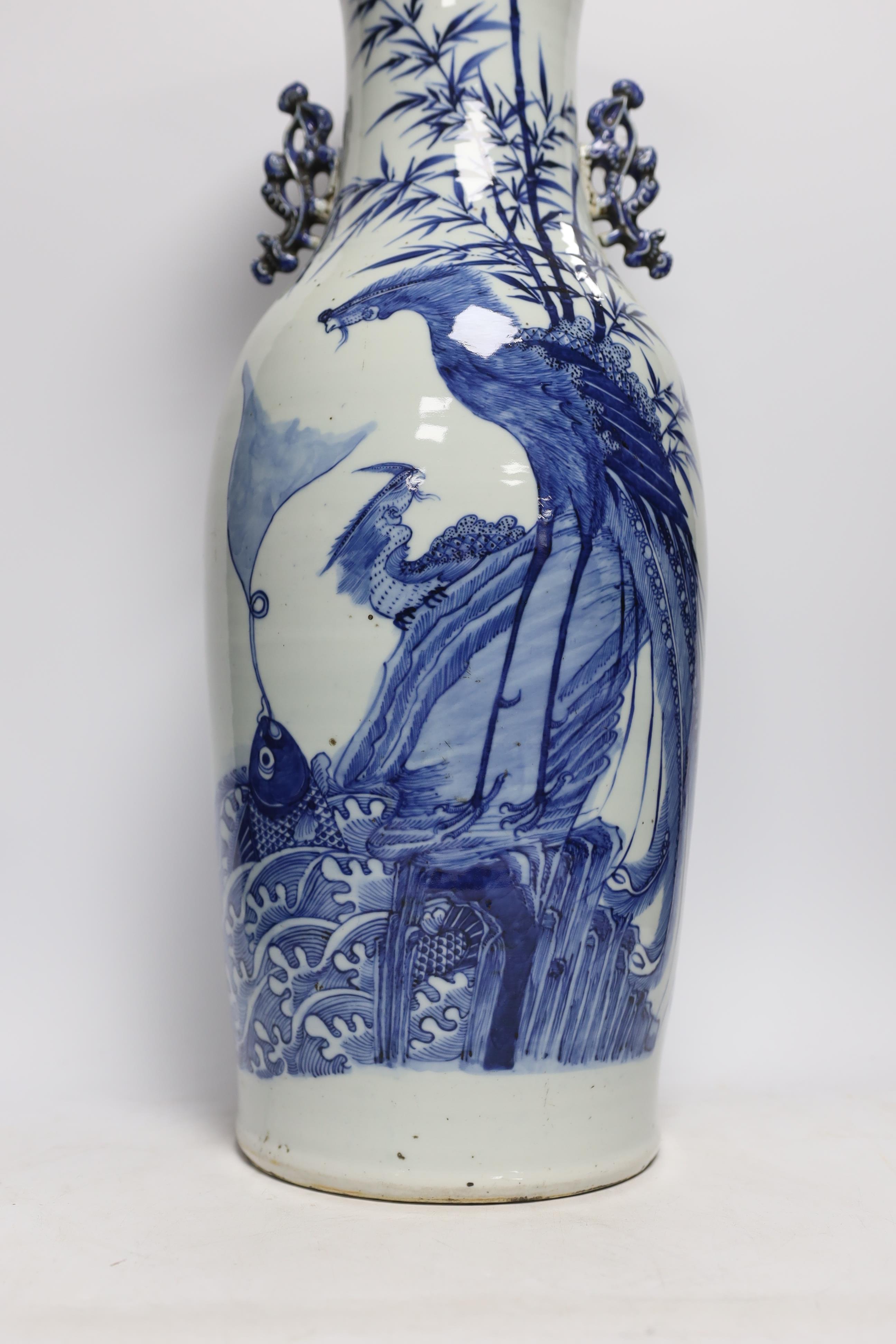 A large Chinese blue and white ‘phoenix and leaping carp’ baluster vase, late 19th century, 59cm high